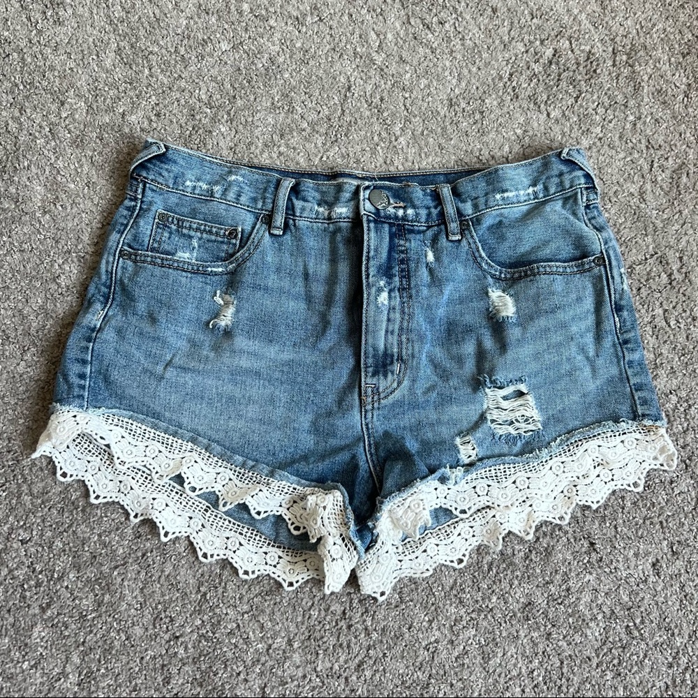 Free People denim shorts with lace detail